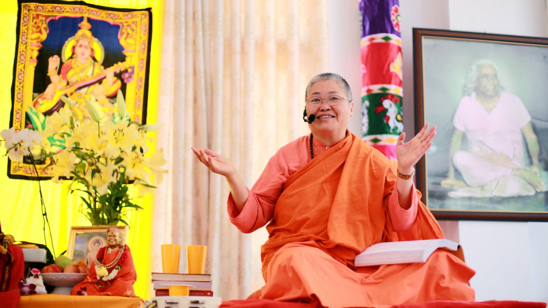 Swami Sita teaching from the Complete Illustrated book of Yoga