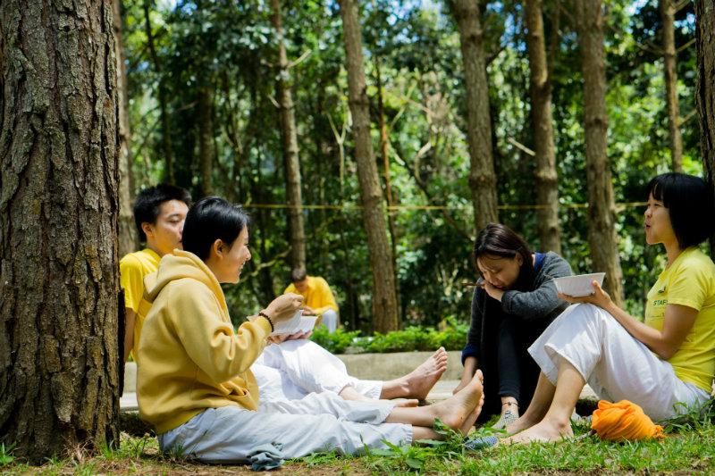 Teacher Training Students happy during karma yoga time